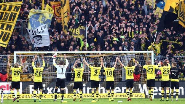 Borussia Dortmund players and fans celebrate