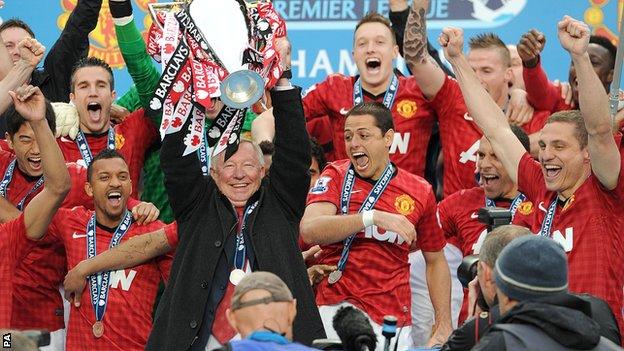 Manchester United manager Sir Alex Ferguson lifts the Premier League trophy