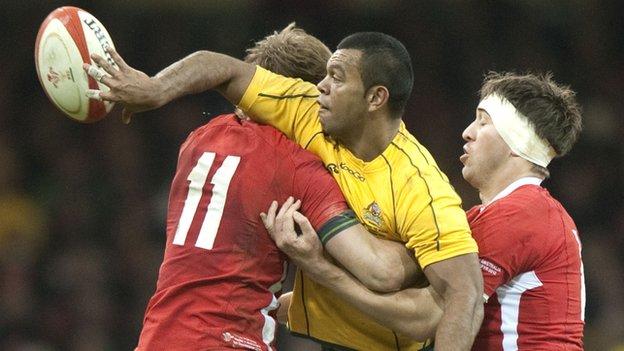 Australia's Kurtley Beale passes against Wales in November, 2012