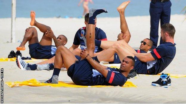 Ashley Cole looks on during the England team warm down session on Copacabana Beach ahead of their friendly match against Brazil