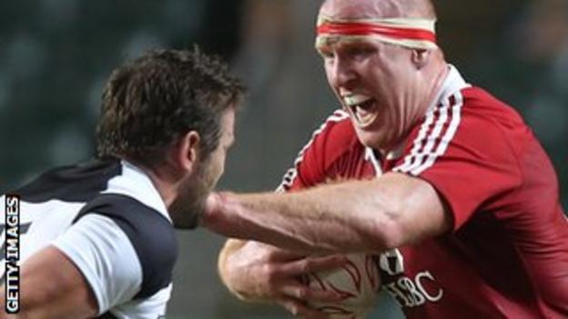 Barbarians full-back Jared Payne prepares to try and tackle Lions captain Paul O'Connell