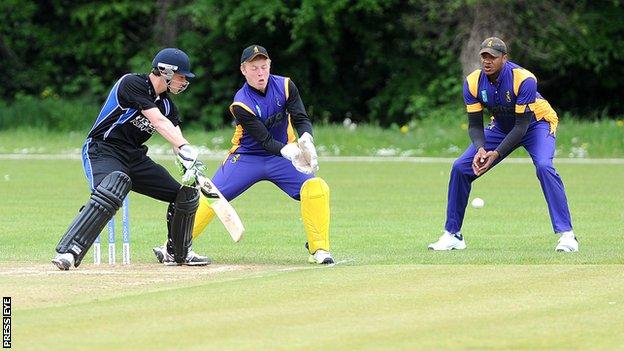 Instonians batsman Chris Doherty, CIYMS wicket keeper Jordan McClurkin and captain Eugene Mollean