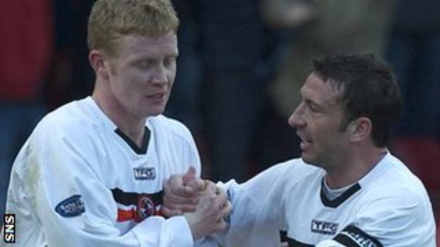 Robson and McInnes celebrate with Dundee United