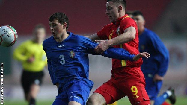 Wales U21 striker Jake Cassidy in action against Moldova