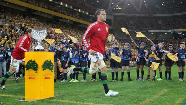 Sam Warburton leads the Lions out