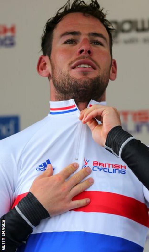 Mark Cavendish zips up the British champion's jersey he won in the National Road Race in Glasgow on Saturday