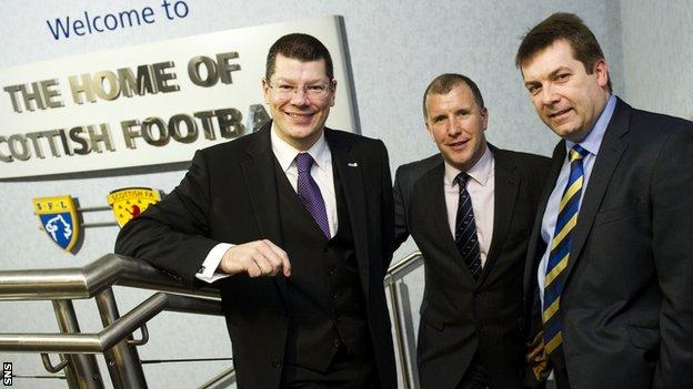 SFA chief executive Stewart Regan, flanked by SPL counterpart Neil Doncaster (left) and the SFL's David Longmuir