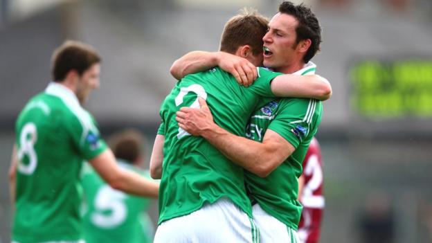 Fermanagh pair Damian Kelly and John Woods embrace at the final whistle following the 3-10 to 1-15 victory over Westmeath