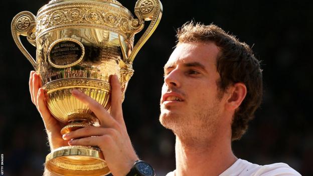 Andy Murray holds the Wimbledon Trophy
