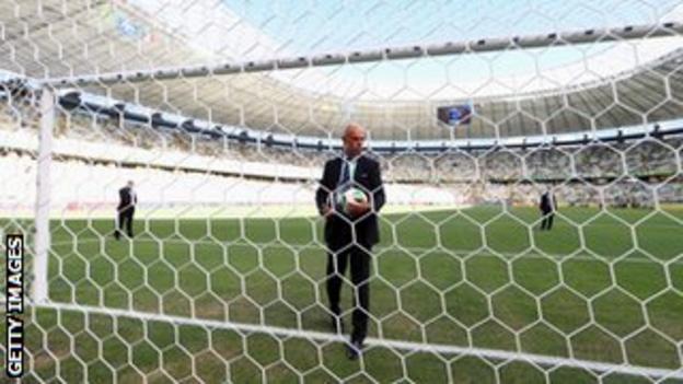 Howard Webb tests the Goal Control system before Brazil play Mexico in the Confederations Cup
