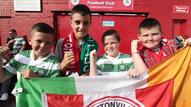 Young fans show off the colours of both teams ahead of Celtic's 3-0 victory over Cliftonville at Solitude