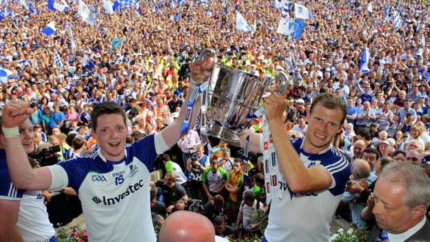 Owen Lennon and Conor McManus celebrate with the Anglo-Celt Cup in front of ecstatic Monaghan supporters
