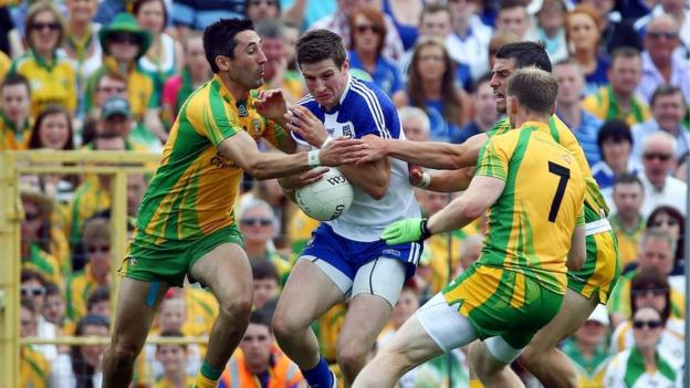 Donegal duo Karl Lacey and Anthony Thompson challenge Monaghan's Darren Hughes