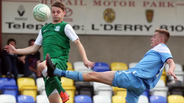 Hibernian's Jay Doyle attempts to get to the ball before Niall Logue of Institute during the Under-19 match at Drumahoe