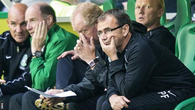 Pat Fenlon looks on from the dugout during Hibs' 7-0 home defeat