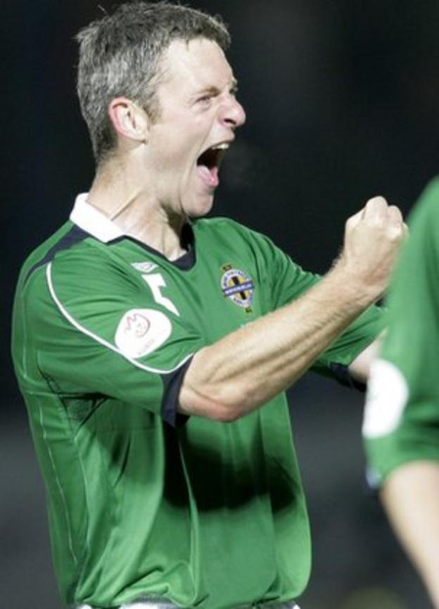 Stephen Craigan celebrates after a Windsor Park win over Latvia in 2006