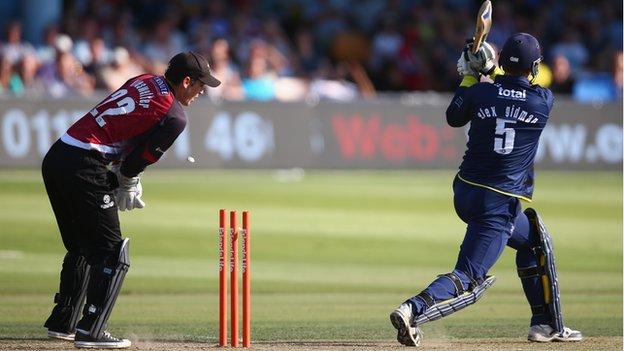 Craig Kieswetter watches as Alex Gidman is bowled by Max Waller