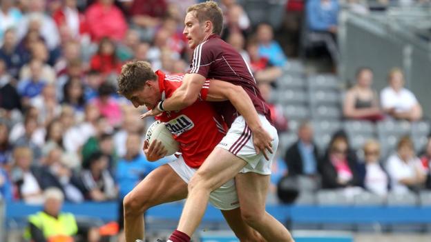 Cork's Aidan Walsh and Gary O'Donnell of Galway