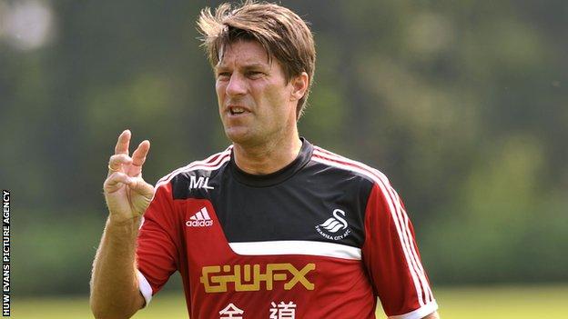 Michael Laudrup making a point during a Swansea training session