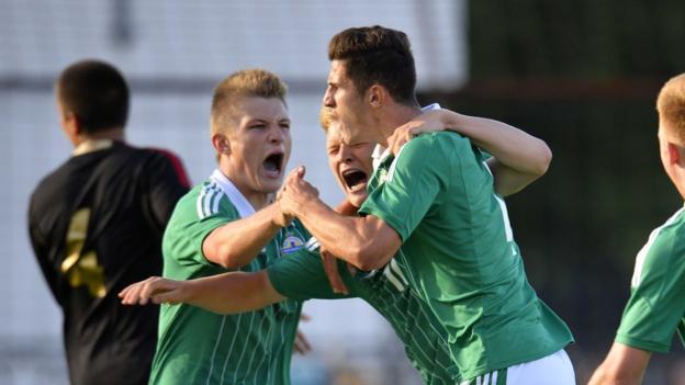 Cameron McGeehan celebrates after giving Northern Ireland the lead in their 2-1 defeat by Mexico at Ballymena Showgrounds
