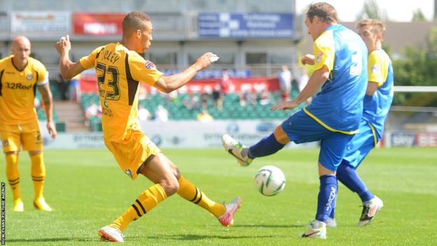 Newport County's Christian Jolley battles for the ball with Accrington Stanley’s Michael Liddle on the opening day of the League Two season.