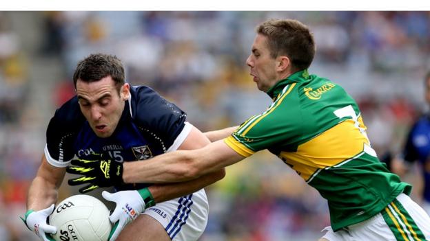 Eugene Keating tries to peel away from Marc O Se during Cavan's quarter-final against Kerry on Sunday