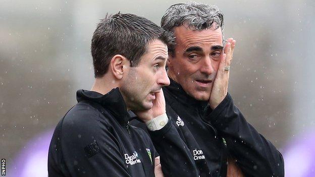Jim McGuinness and his assistant Rory Gallagher watch as things go all wrong for their team in the All-Ireland quarter-final