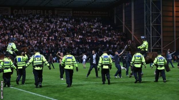 Some Preston supporters ran on to the pitch at the final whistle