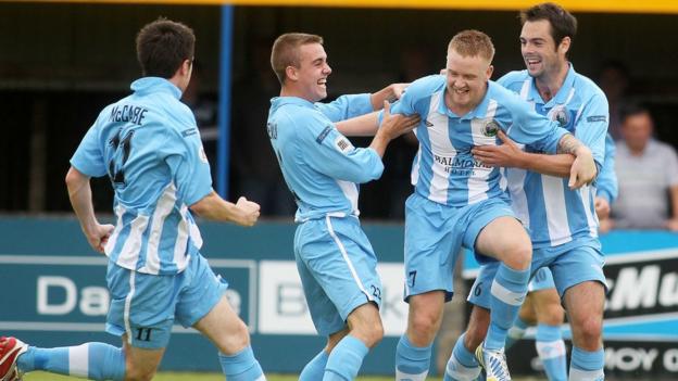 Kenny Kearns celebrates with team-mates after scoring Warrenpoint Town's first goal in the Premiership - but they lost 3-2 to Dungannon Swifts