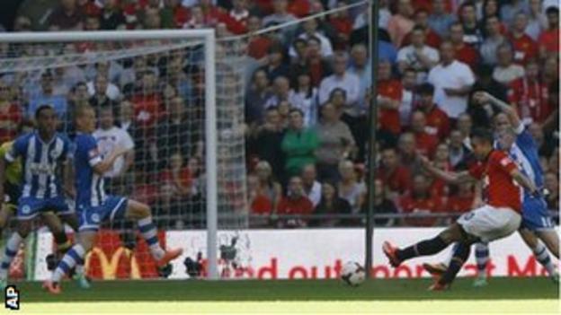 Robin van Persie scores Manchester United's second goal against Wigan