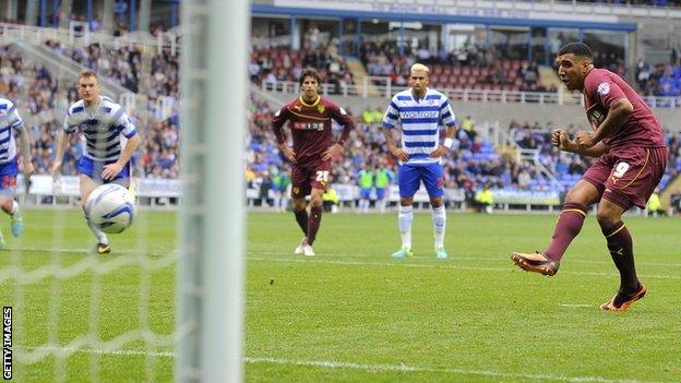 Troy Deeney scores a penalty for Watford at Reading
