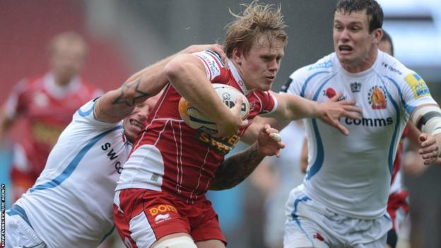 Scarlets' Dan Thomas is halted as they lose 23-15 in a pre-season clash against Exeter at Parc y Scarlets