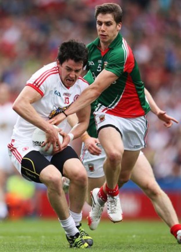 Mayo's Lee Keegan and Matthew Donnelly of Tyrone