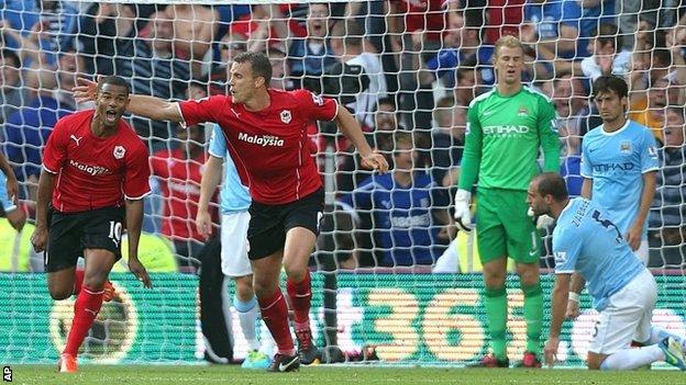 Fraizer Campbell (left) celebrates scoring for Cardiff
