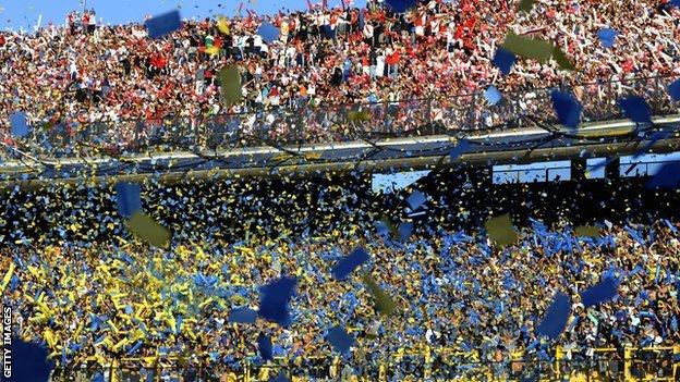 Fans of Boca Juniors (bottom) and River Plate (top) before the 2013 Superclasico at La Bombonera