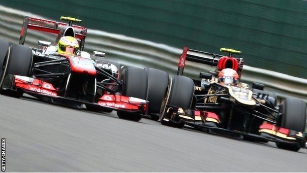 Sergio Perez (lefty) and Romain Grosjean duel in Belgium
