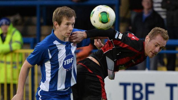 Johnny Watt and Timmy Adamson contend for the ball as Coleraine draw 2-2 with Crusaders