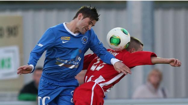 Daniel Keohane and Ruairi Devlin in action during the Premiership game at Ferney Park