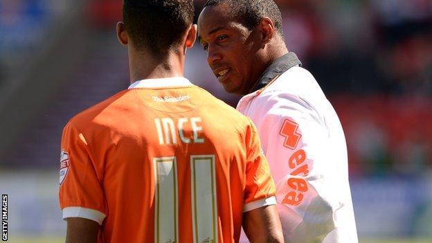 Tom Ince and Paul Ince (right)