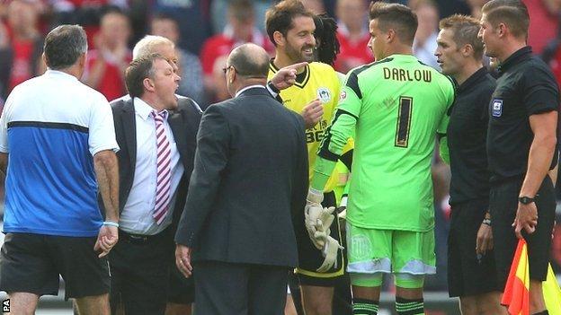 Nottingham Forest manager Billy Davies confronts officials after the game against Wigan