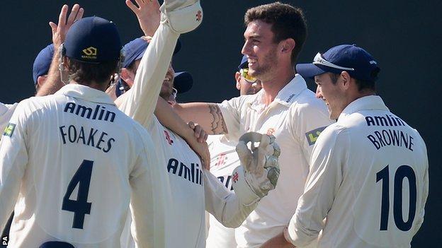 Essex players celebrate Reece Topley's 11-wicket haul