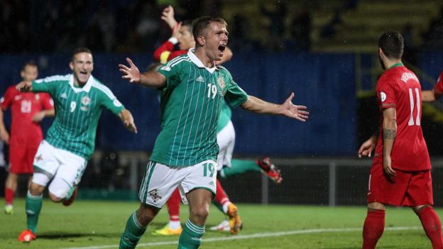 Jamie Ward celebrates after scoring Northern Ireland's second goal in the Group F qualifier