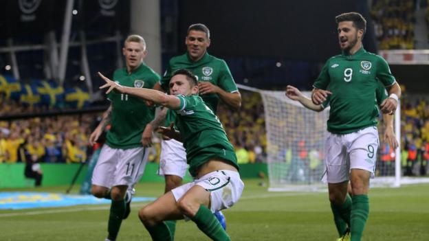 Robbie Keane begins his trademark celebration after giving the Republic of Ireland the lead in their Group C qualifier