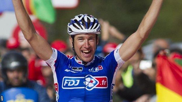Frenchman Alexandre Geniez raises his arms aloft after winning stage 15 of the Vuelta