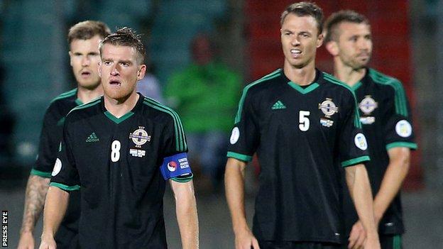 Northern Ireland's disappointed players after the defeat by Luxembourg