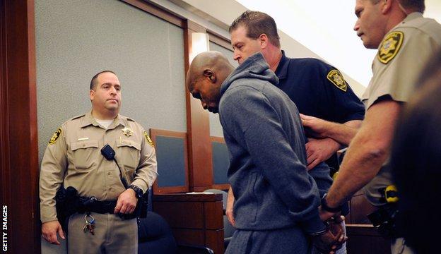 Mayweather is led away after being sentenced to 90 days in prison in 2011