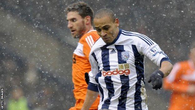Peter Odemwingie in 2012 action for West Brom against Swansea City