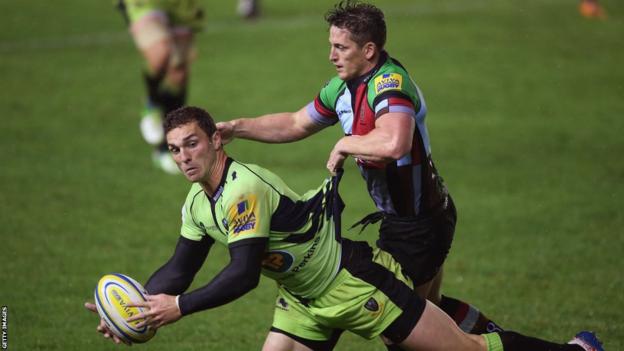 Northampton wing George North is halted by Harlequins' Tom Williams in the Saints' 13-6 Aviva Premiership win at The Stoop