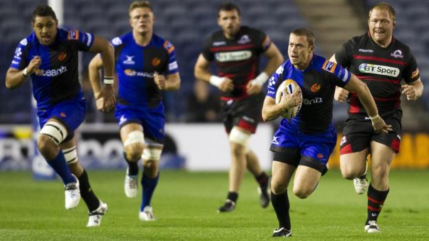Richie Rees scores a try against his former team as the Dragons battle hard