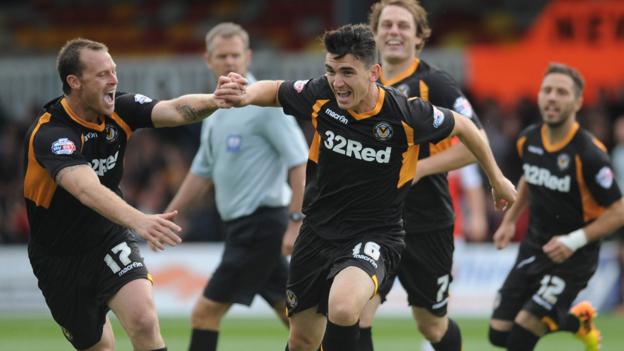 Billy Jones celebrates scoring just two minutes into his debut for Newport County against Morecambe at Rodney Parade. But the match ended in a 3-2 defeat for Newport.